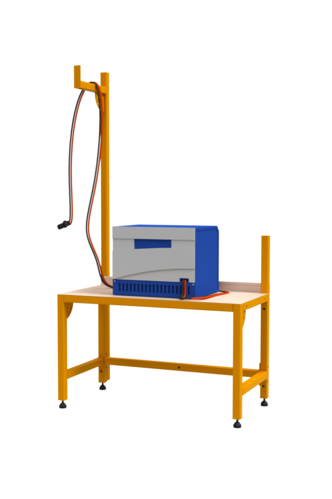 Workbench with blue box and power cables.