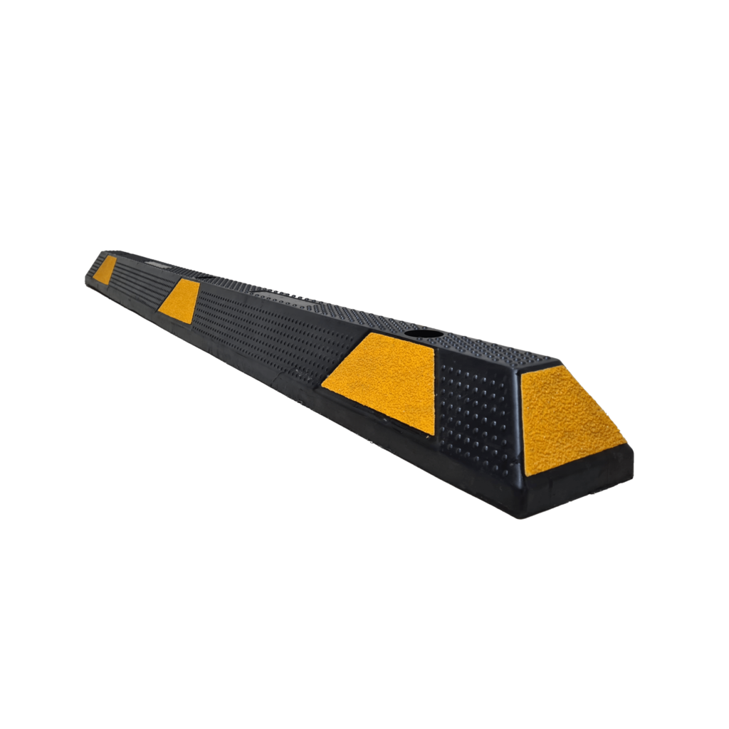 Black rubber speed hump with yellow markings