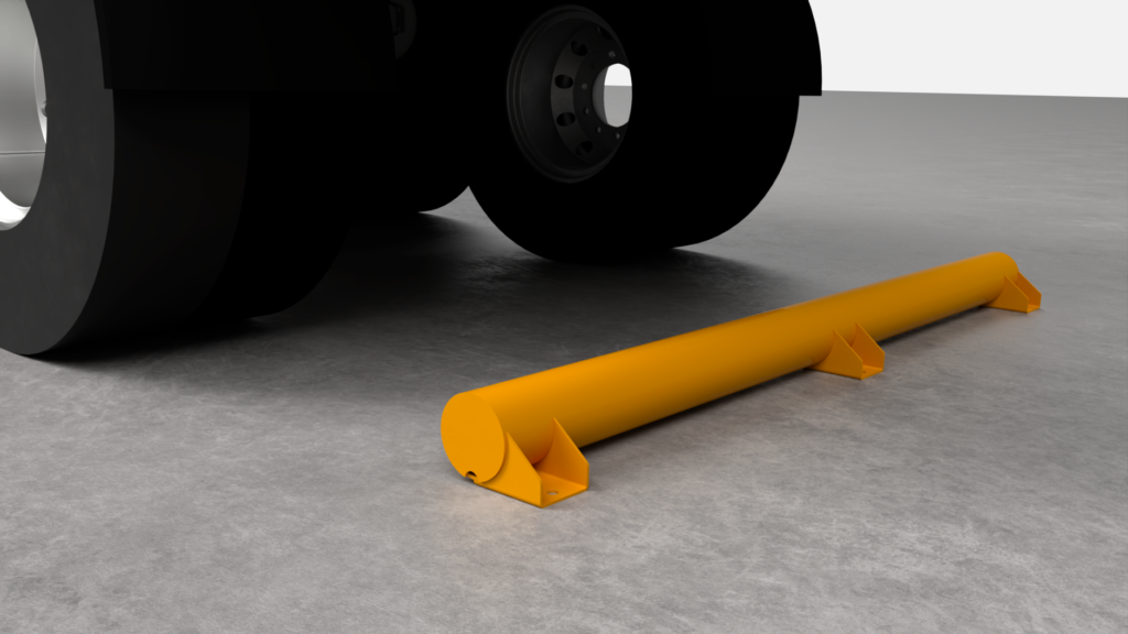 Orange safety barrier next to a truck wheel.
