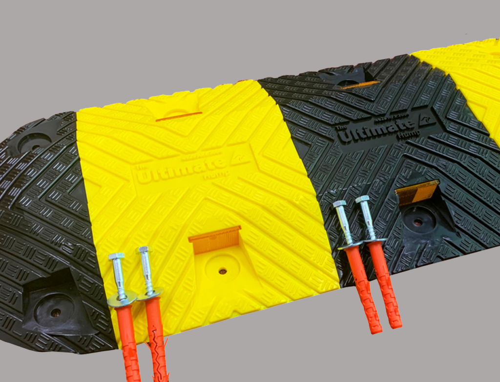 Yellow and black rubber ramp with hardware