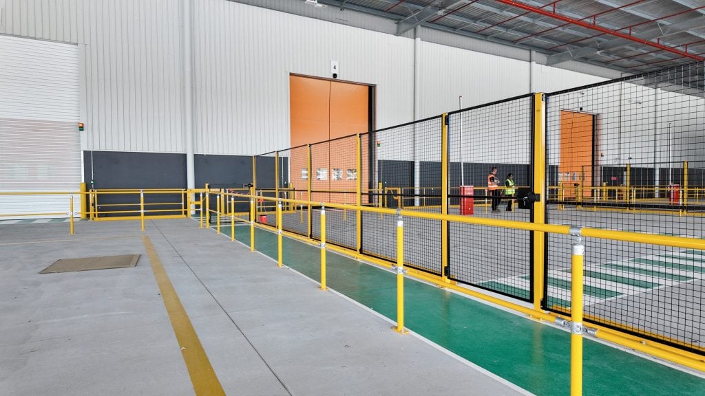Interior of a safety-fenced industrial area.
