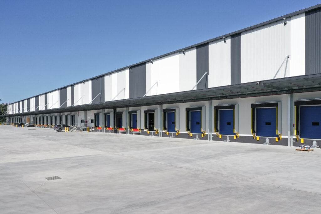 Exterior view of a modern warehouse loading docks.