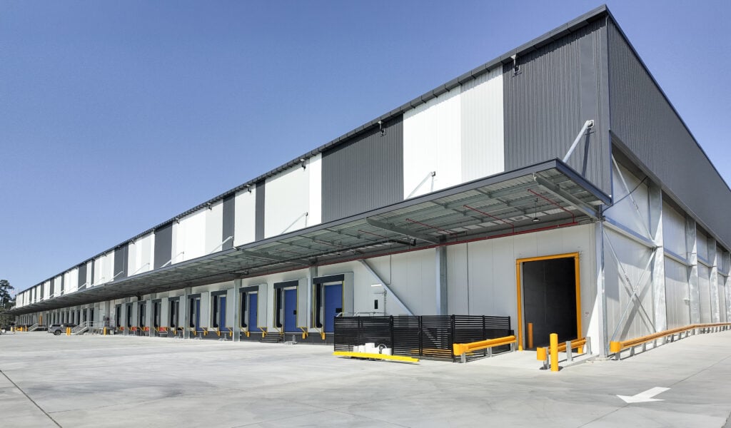 Large industrial warehouse building with loading docks