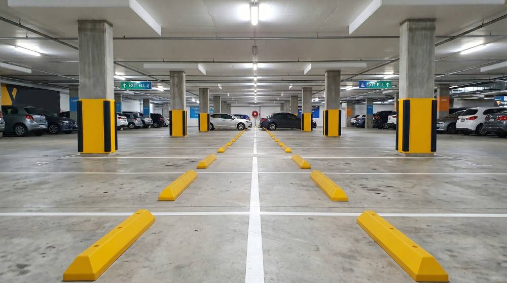 Underground car park with yellow wheel stops