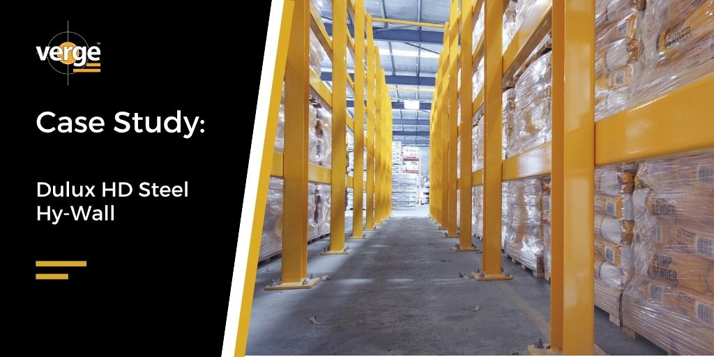Warehouse aisle with yellow steel pallet racking