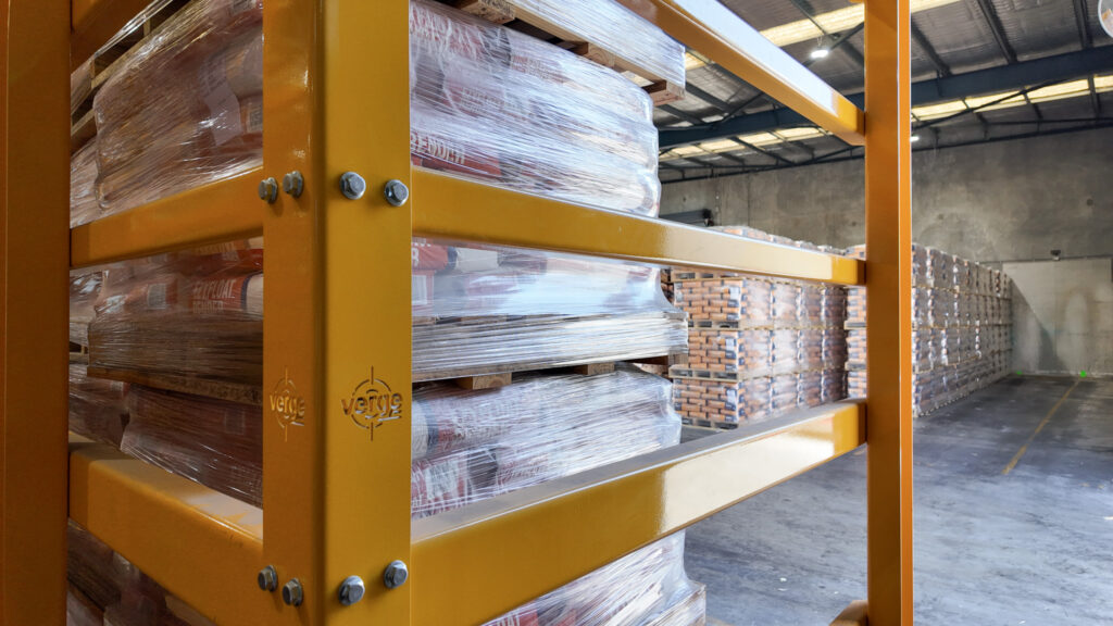 Palletised goods wrapped in plastic inside warehouse