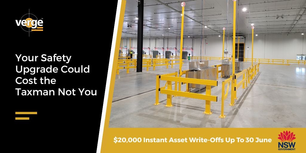 Warehouse interior with yellow safety barriers installed