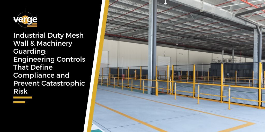 Industrial warehouse with yellow mesh safety fencing