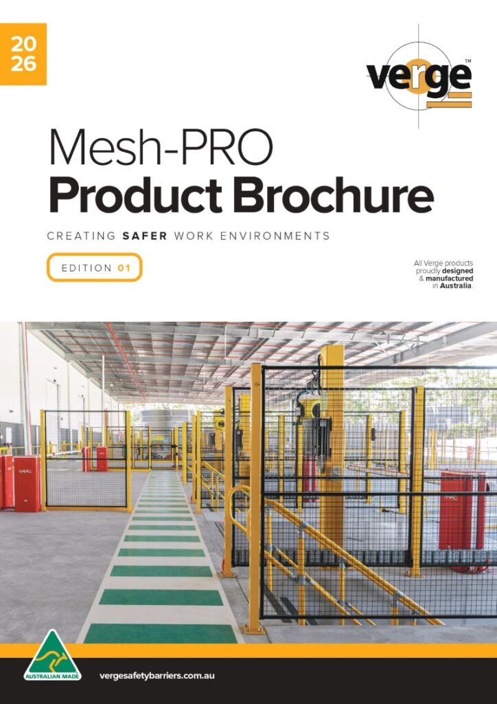 Industrial warehouse with yellow mesh safety barriers